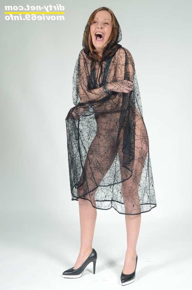 25P MILF Lea Blow waering a see-through cape and high heels