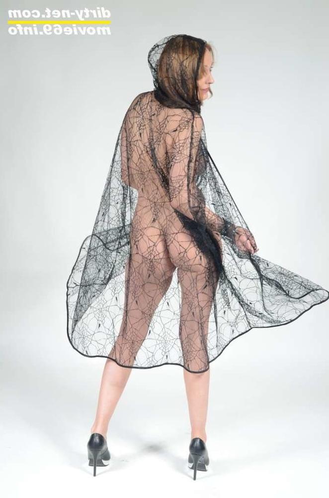 25P MILF Lea Blow waering a see-through cape and high heels