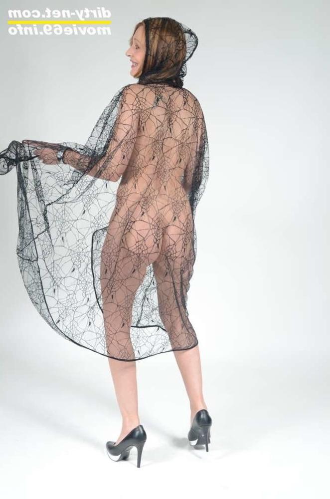 25P MILF Lea Blow waering a see-through cape and high heels