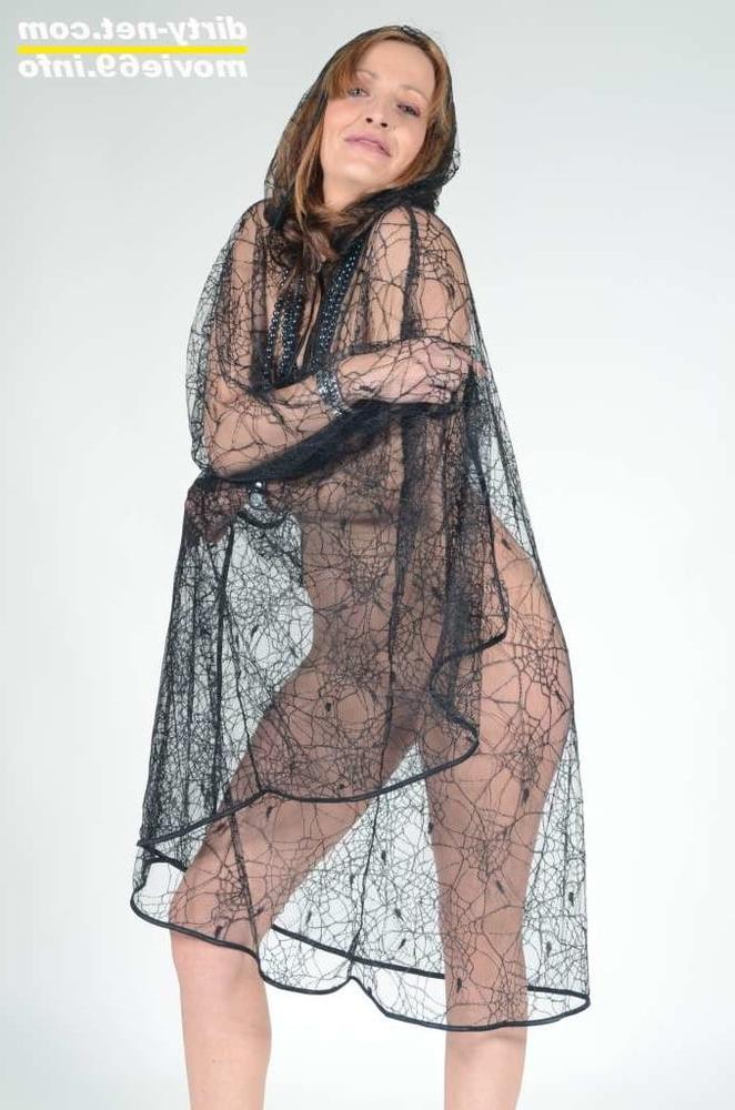25P MILF Lea Blow waering a see-through cape and high heels