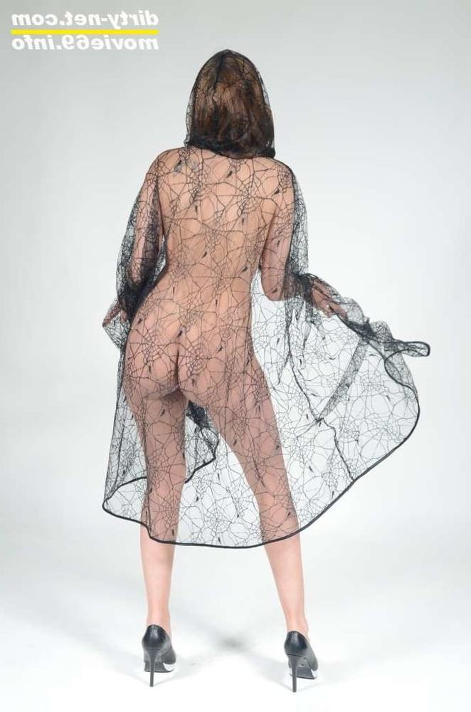 25P MILF Lea Blow waering a see-through cape and high heels