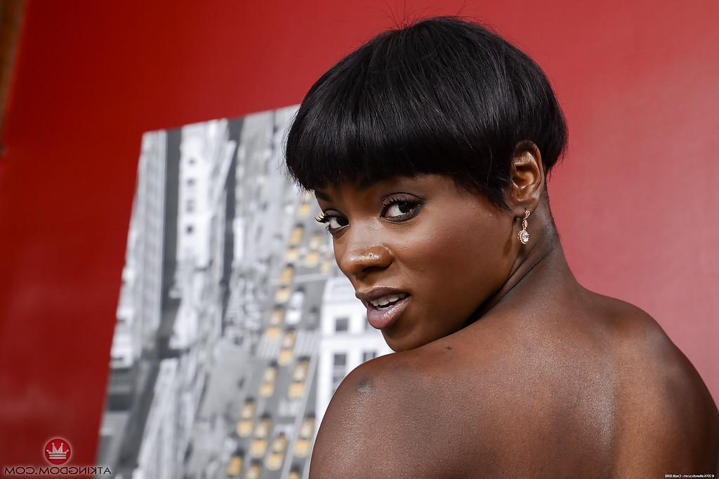 16P Leggy ebony amateur Ana Foxxx flashing small tits before slipping out of skirt