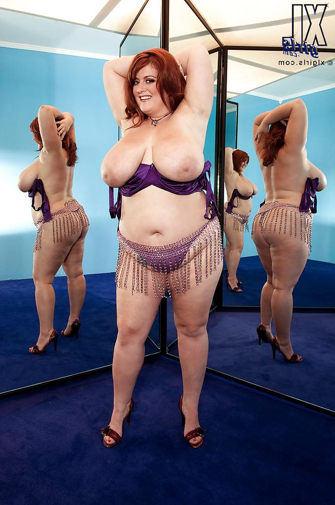 16P Redhead fatty Jade Parker stripping and stuffing her snatch with a huge toy