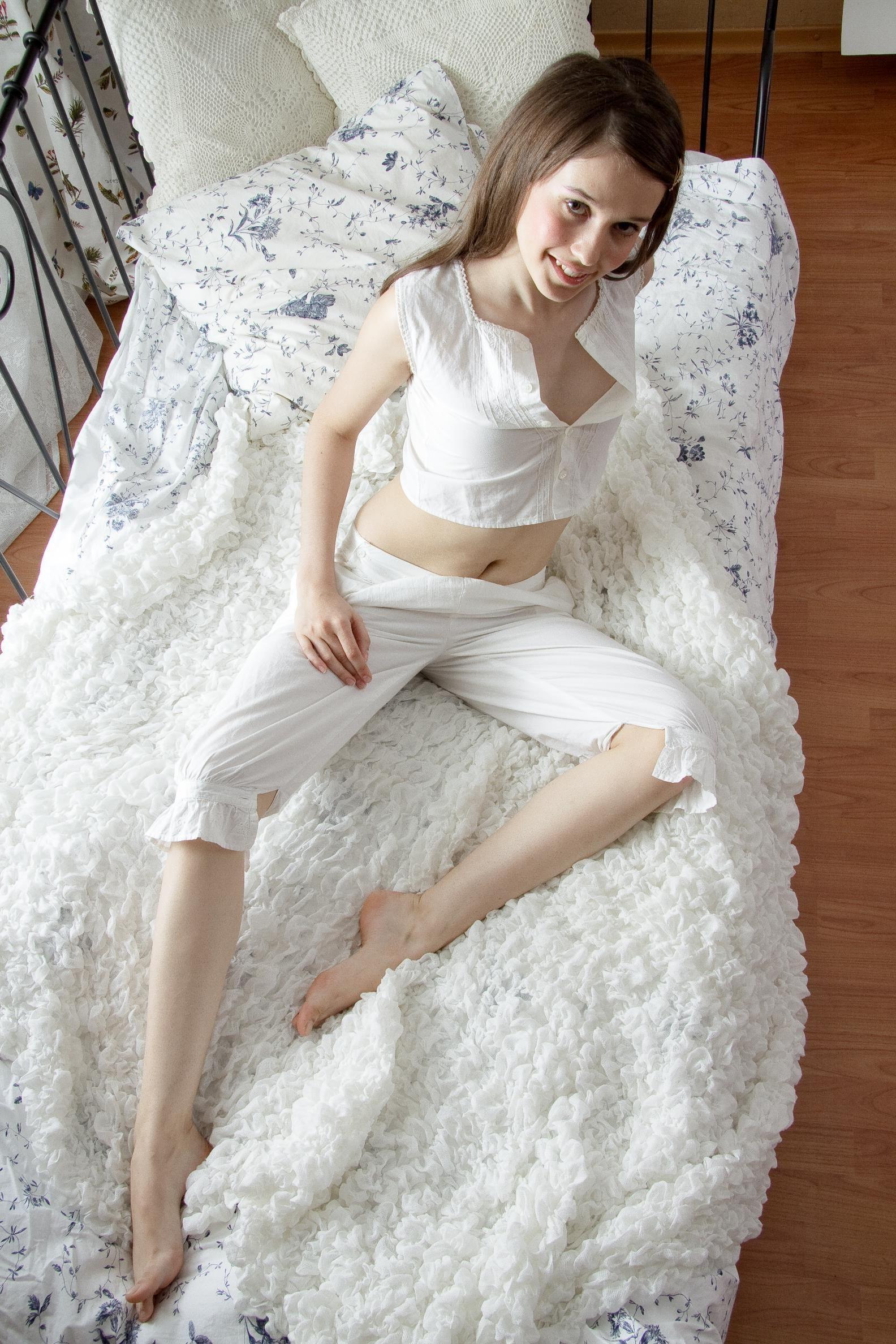 20P Pictures of teen girl Abelinda hot and horny for you in bed