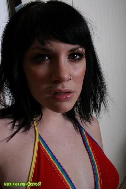 20P Pictures of teen Rock Christina exposing her tits and pussy