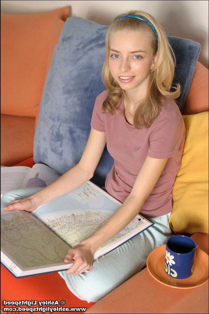 20P Pictures of teen cutie Ashley Lightspeed showing you her perky round tits