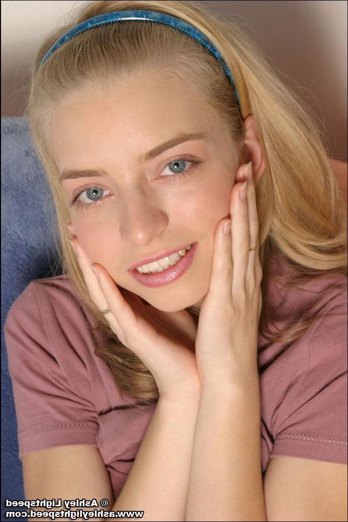 20P Pictures of teen cutie Ashley Lightspeed showing you her perky round tits