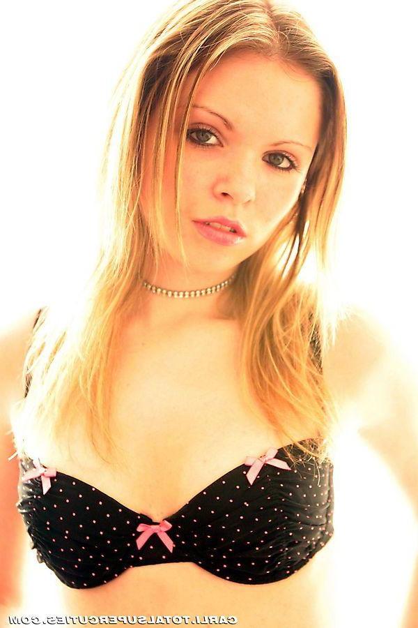 20P Pictures of teen girl Carli showing her perky tits