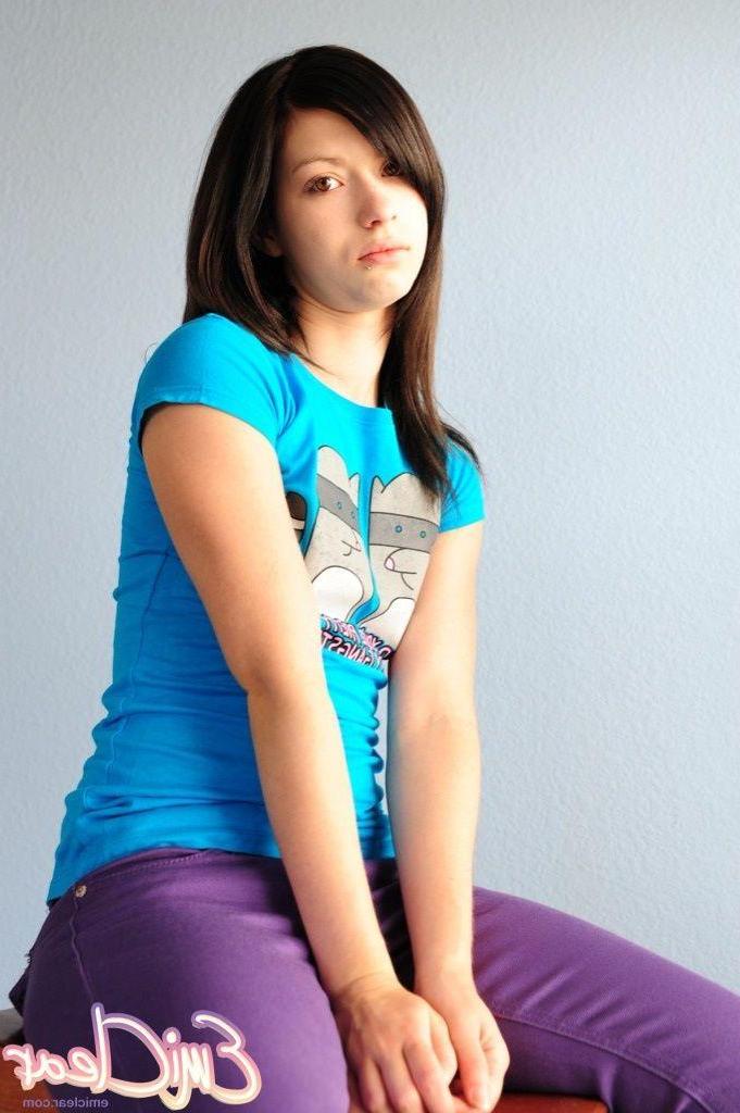 20P Pictures of teen Emi Clear stripping to her socks