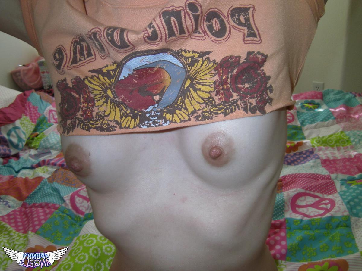 20P Petite brunette amateur takes selfies of her tight pussy
