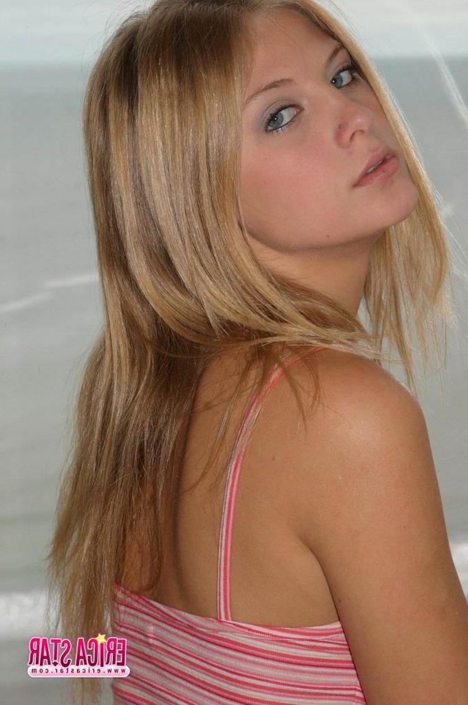 15P Pictures of teen babe Erica Star teasing in a dress