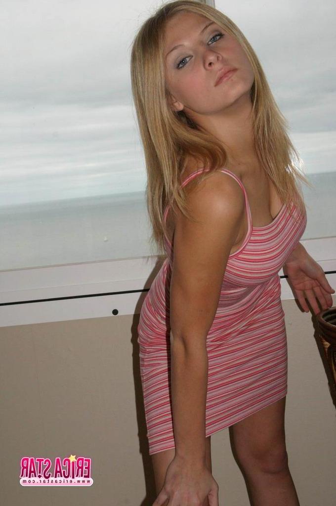 15P Pictures of teen babe Erica Star teasing in a dress