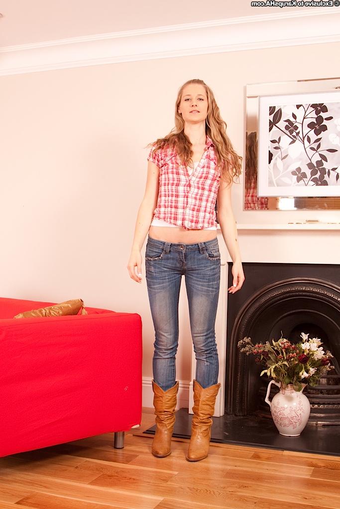 16P Pretty amateur teen named Roxy in the wild poses on the red sofa