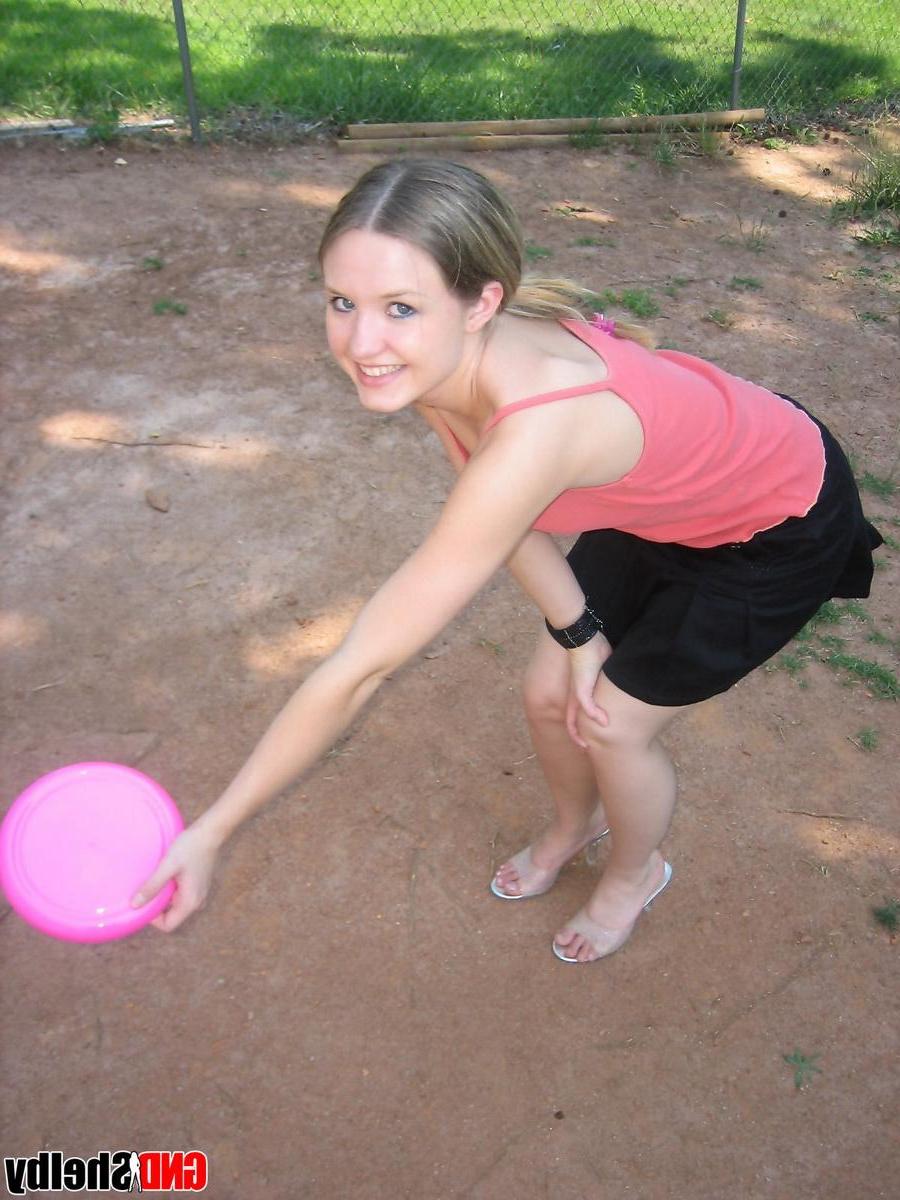 12P Perky teen Shelby flashes her tits outside while playing around