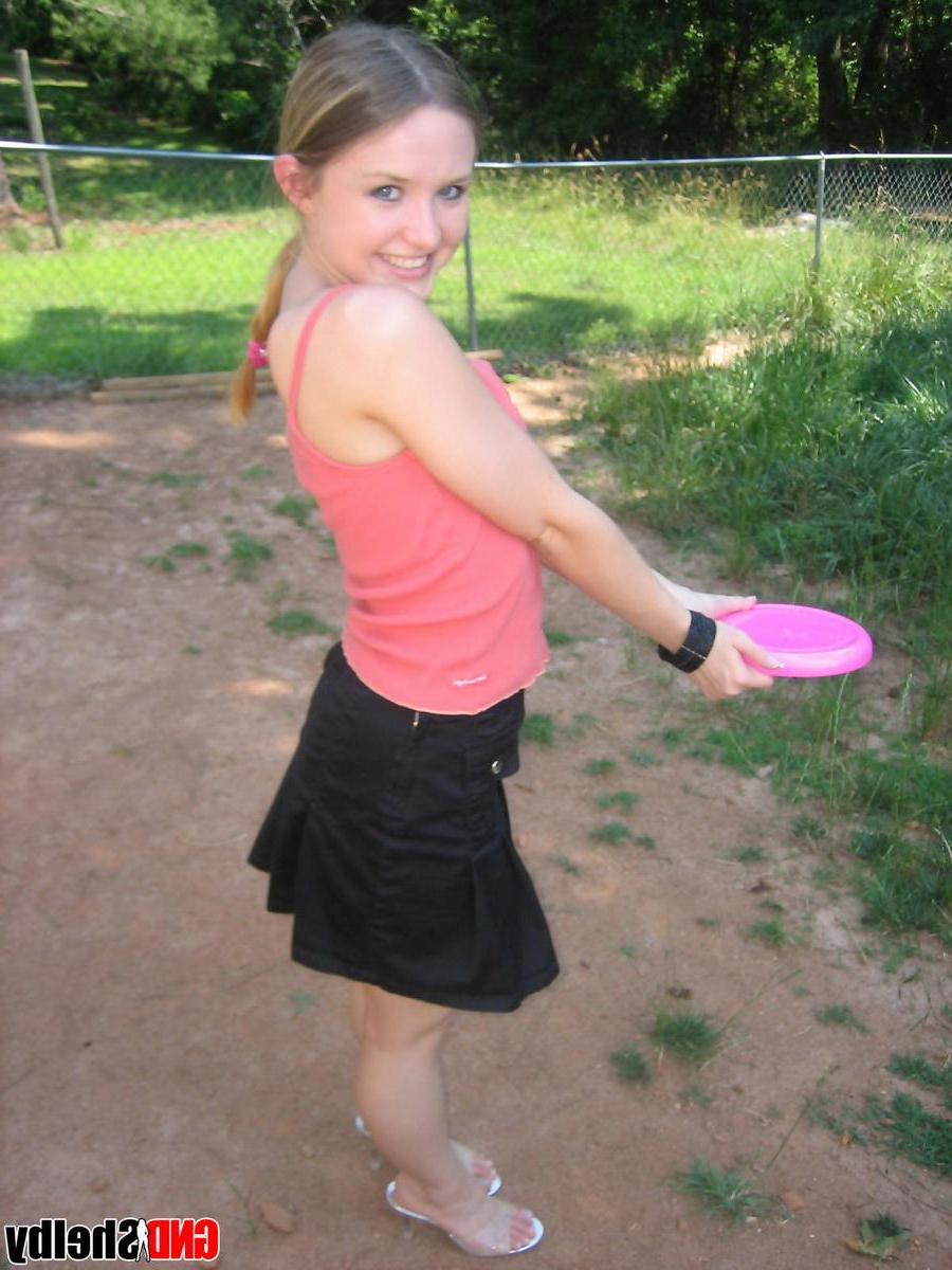 12P Perky teen Shelby flashes her tits outside while playing around