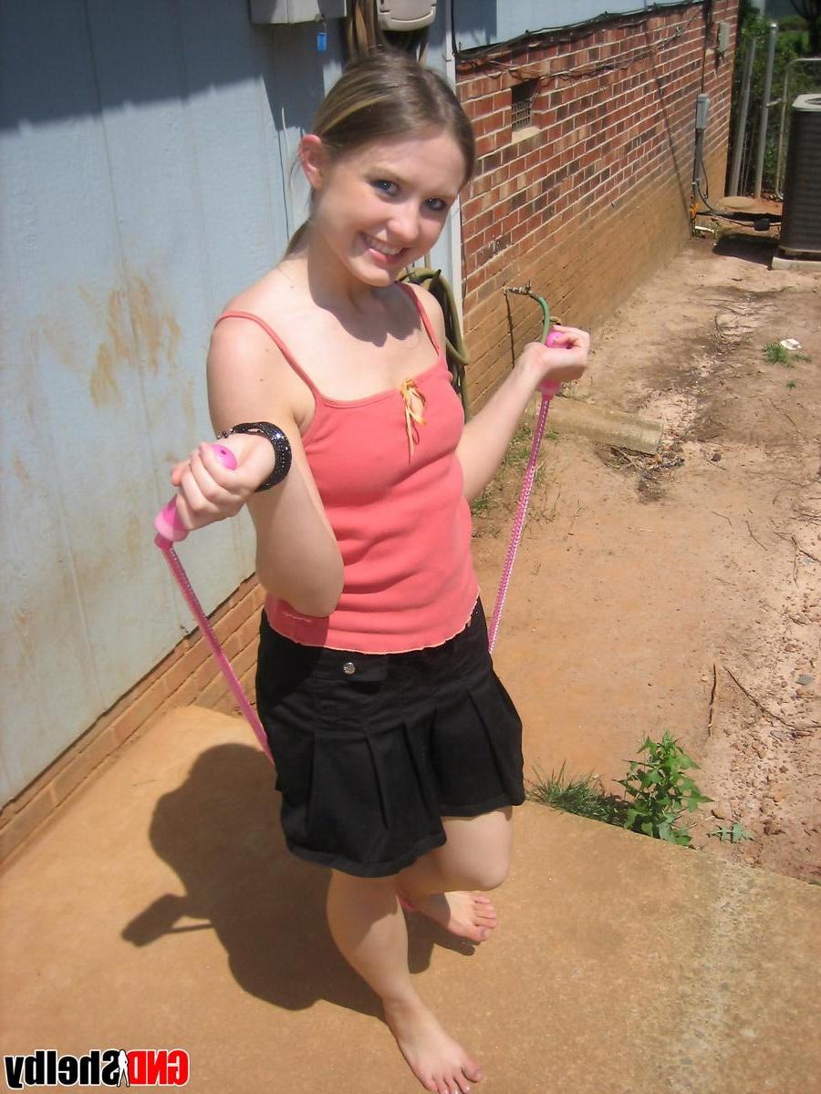 12P Perky teen Shelby flashes her tits outside while playing around