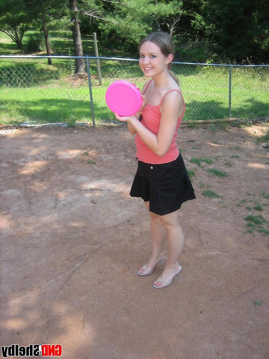 12P Perky teen Shelby flashes her tits outside while playing around