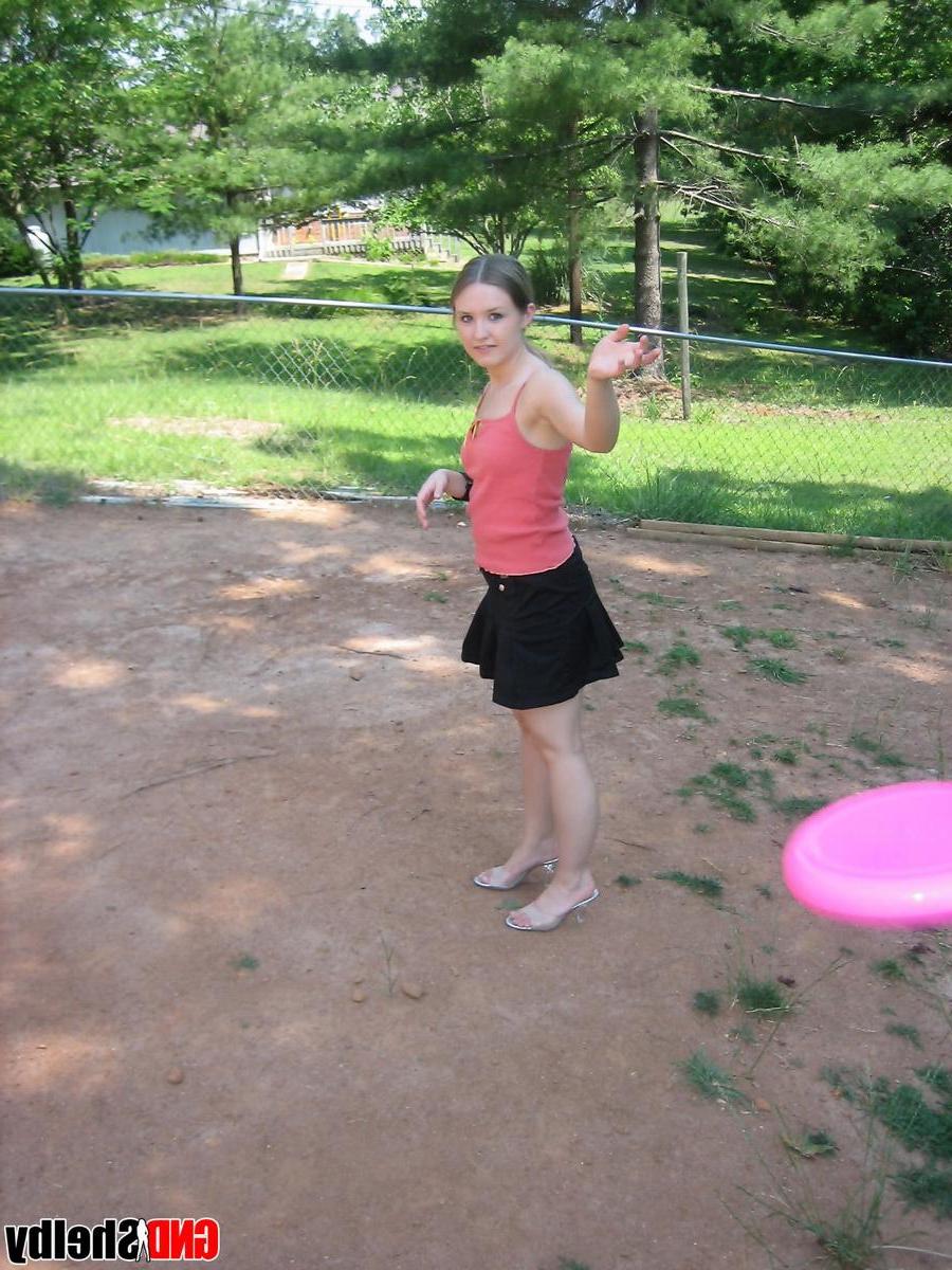 12P Perky teen Shelby flashes her tits outside while playing around