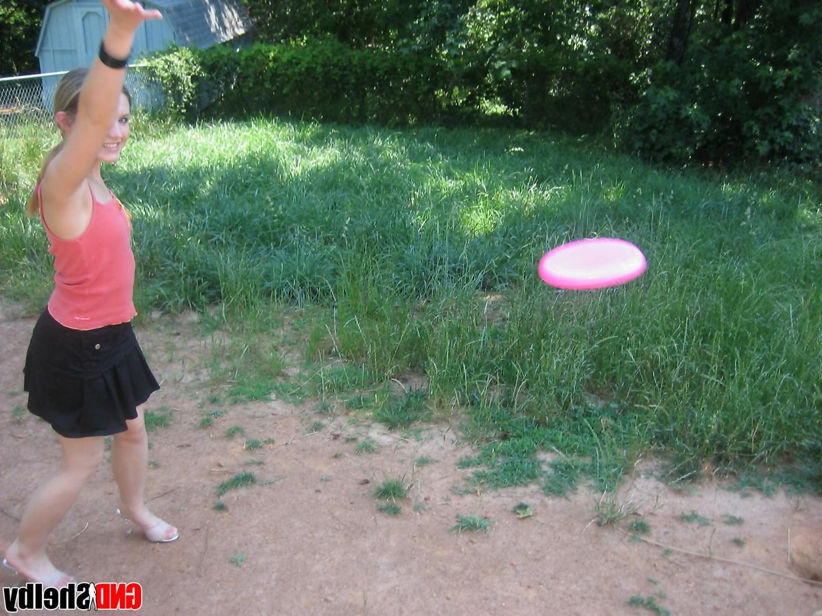 12P Perky teen Shelby flashes her tits outside while playing around