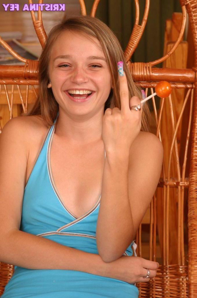 15P Pictures of teen Kristina Fey licking a lollipop and her tits