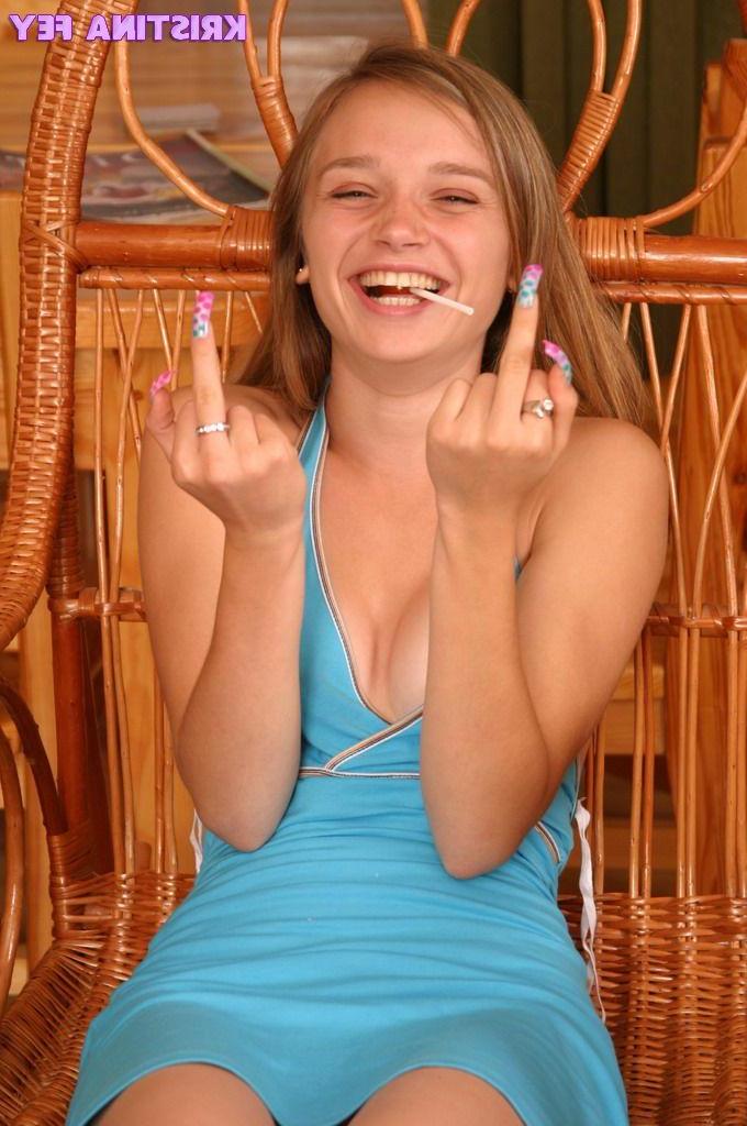 15P Pictures of teen Kristina Fey licking a lollipop and her tits