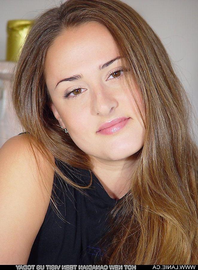 20P Pictures of Lanie.ca exposing her perky tits