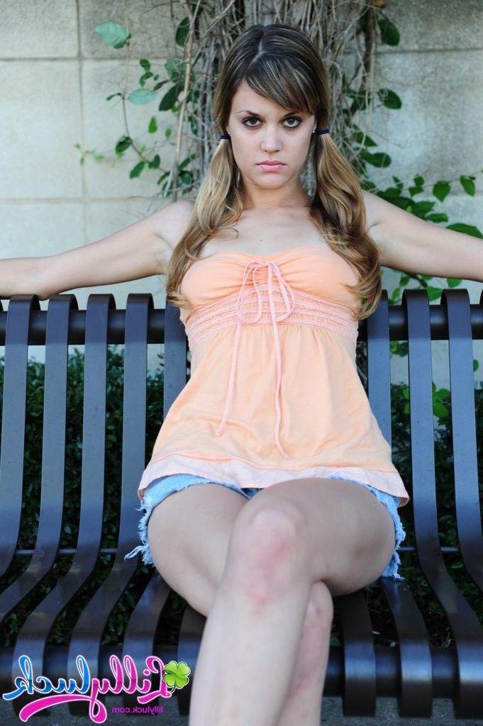 20P Pictures of teen model Lilly Luck flashing her tits and pussy outside