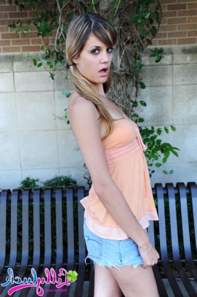 20P Pictures of teen model Lilly Luck flashing her tits and pussy outside