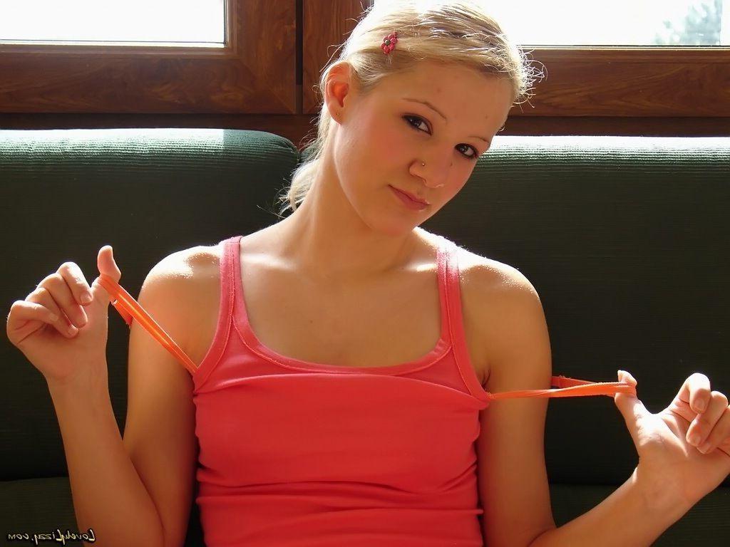 20P Pictures of teen babe Lovely Lizzy teasing with her hot body