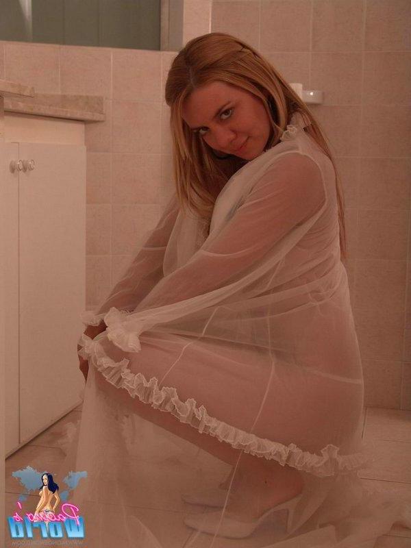 15P Pictures of blonde teen Melissa showing her perky titties in sheer