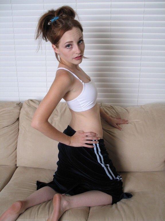 18P Pictures of Susie Tease cupping her perky tits