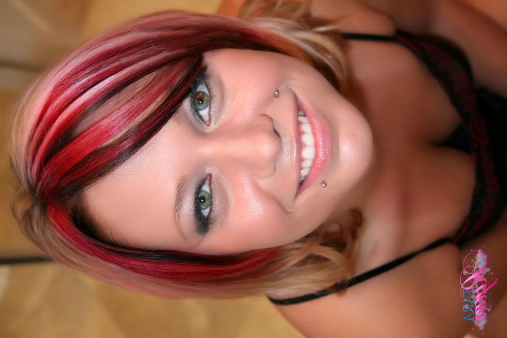 20P Pictures of teen babe Tara Ryan riding a massive black dildo
