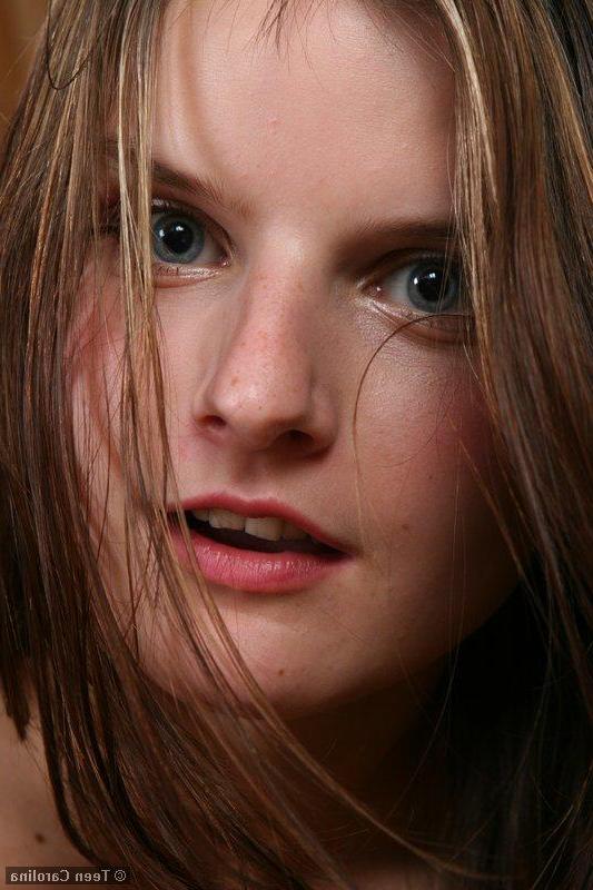 20P Pictures of Teen Carolina playing with her panties