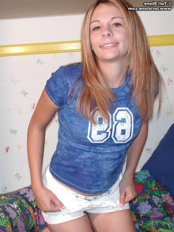 20P Tori Stone exposes her perky tits