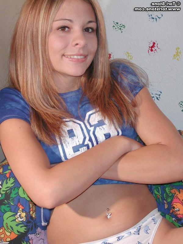 20P Tori Stone exposes her perky tits