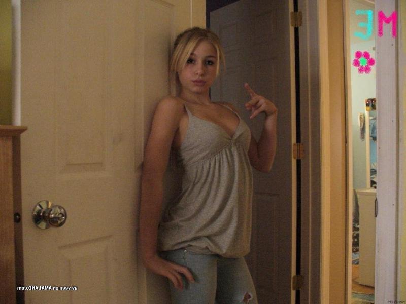 15P Pictures of a cute blonde amateur teen displaying her fine breasts