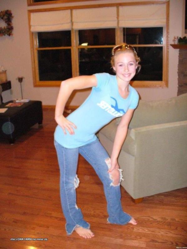 15P Pictures of a cute blonde amateur teen displaying her fine breasts