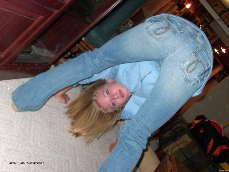 15P Pictures of a cute blonde amateur teen displaying her fine breasts