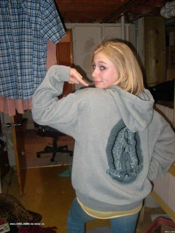 15P Pictures of a cute blonde amateur teen displaying her fine breasts