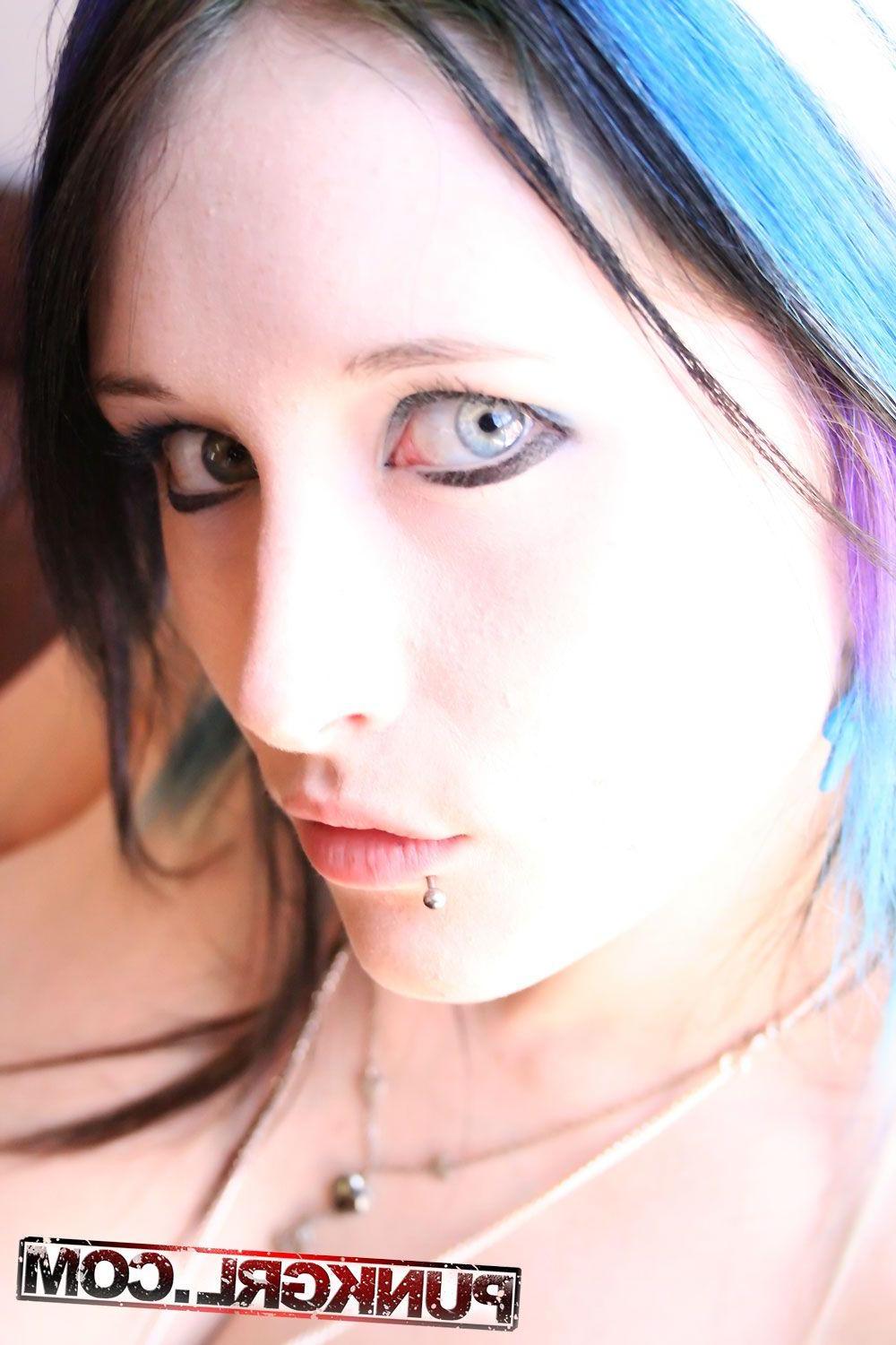20P Pictures of a hot punk teen teasing in fishnets