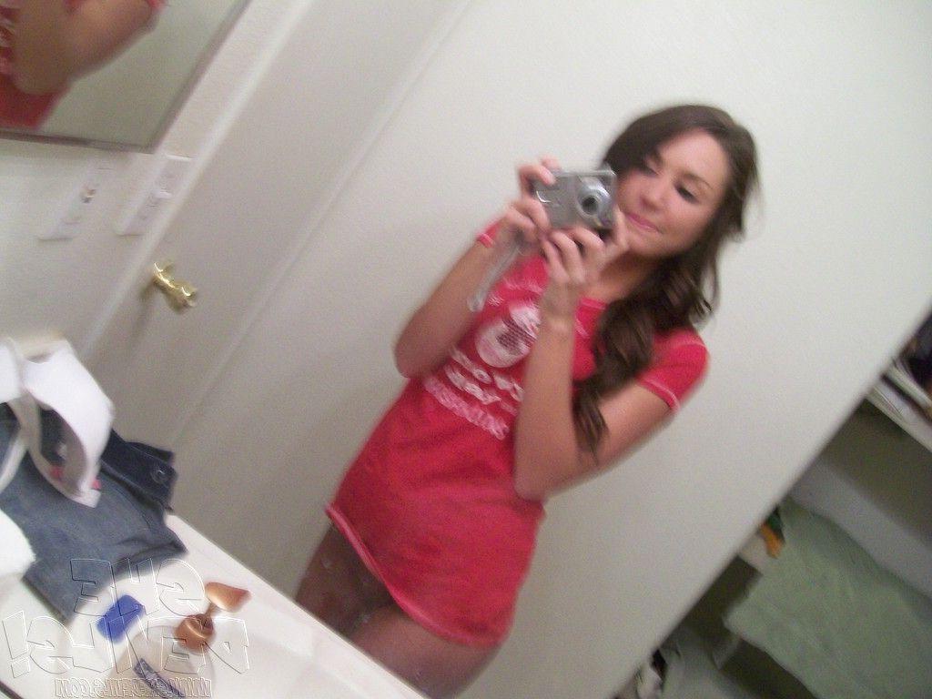 14P Pictures of a hot teen girl with a camera