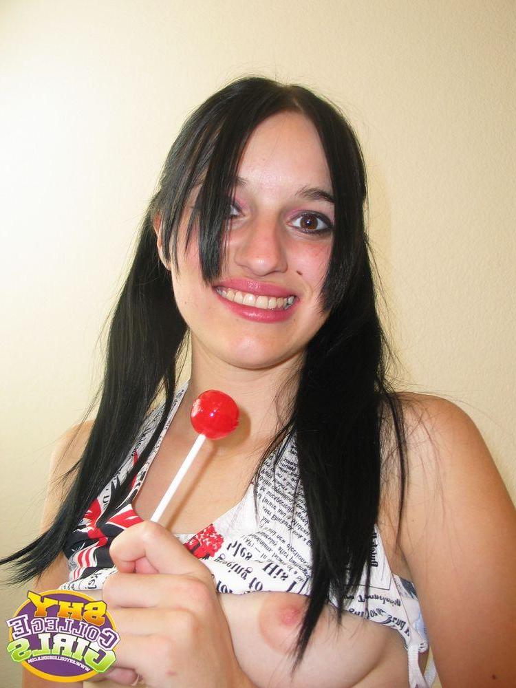 16P Pictures of a teen in pigtails sucking on a lolipop