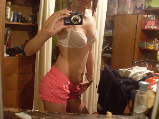 15P Pictures of naughty blonde teen girlfriends taking pics of themselves