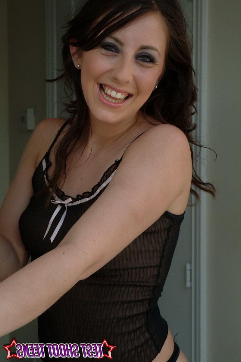 16P Pictures of a hot brunette teen wearing sheer black lingerie