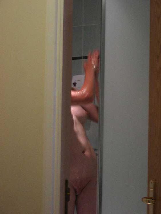 15P Showering amateur milf Frances in voyeur footage