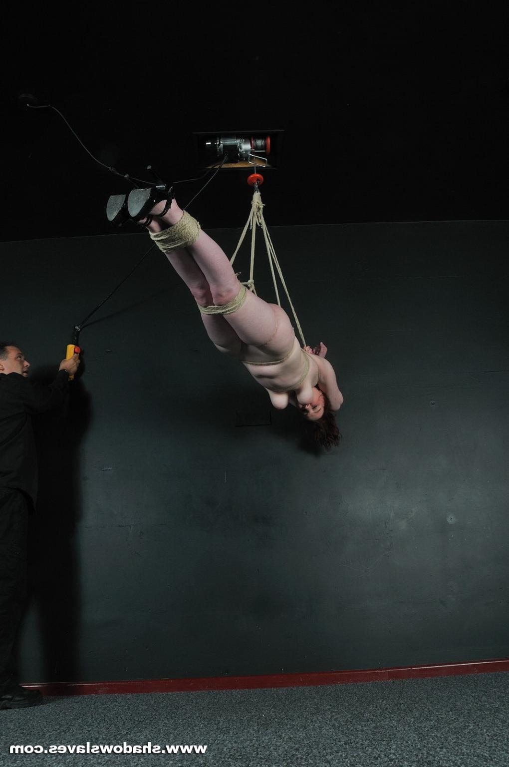 16P Redhead in suspension bondage