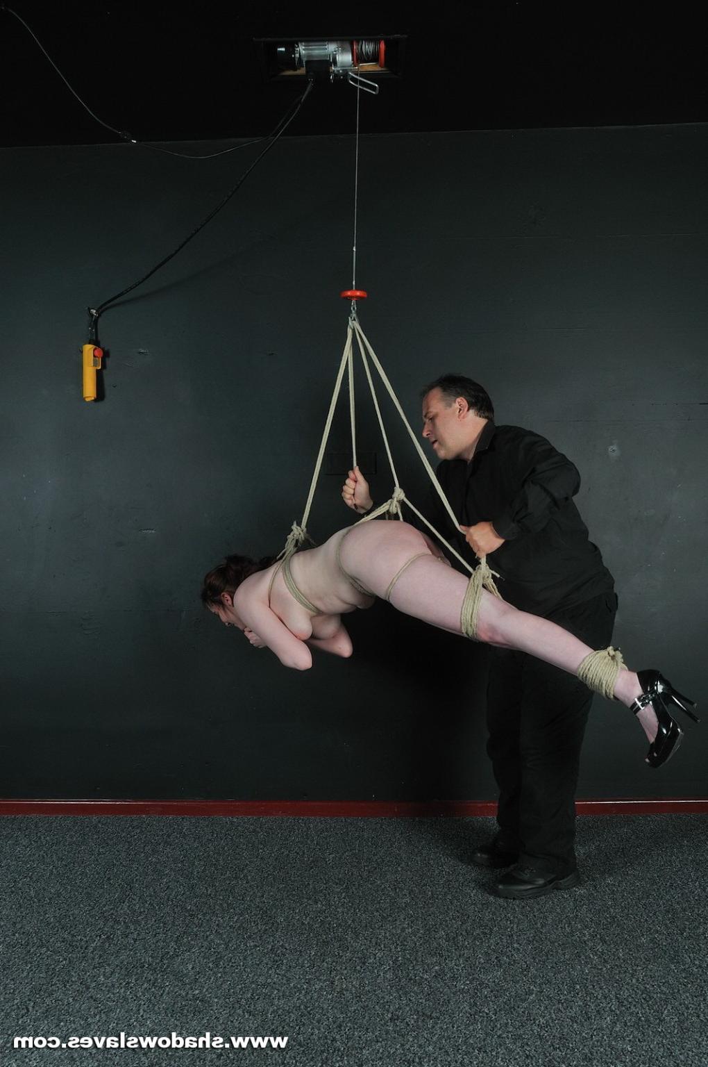 16P Redhead in suspension bondage