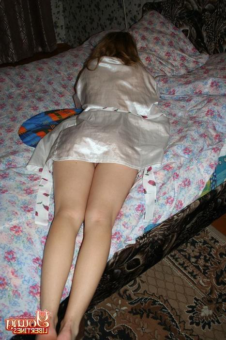 16P Shy lovely teen teasing the camera with her sensual body