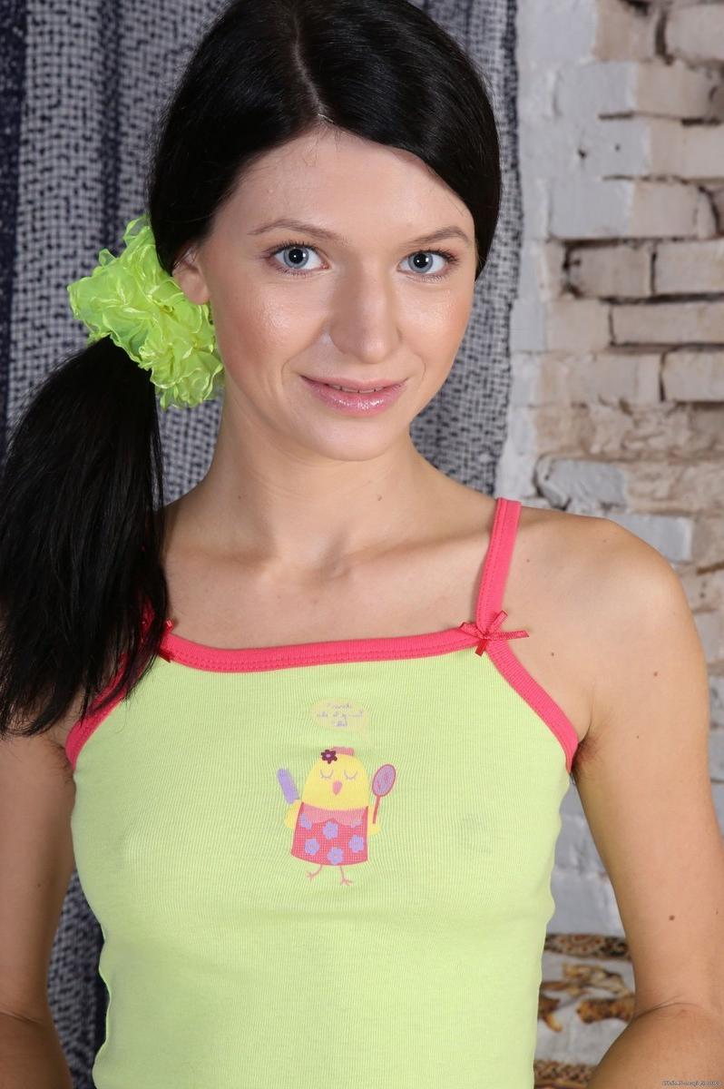 15P Cute hairy amateur teen Reana spreading her tight little hairy pussy