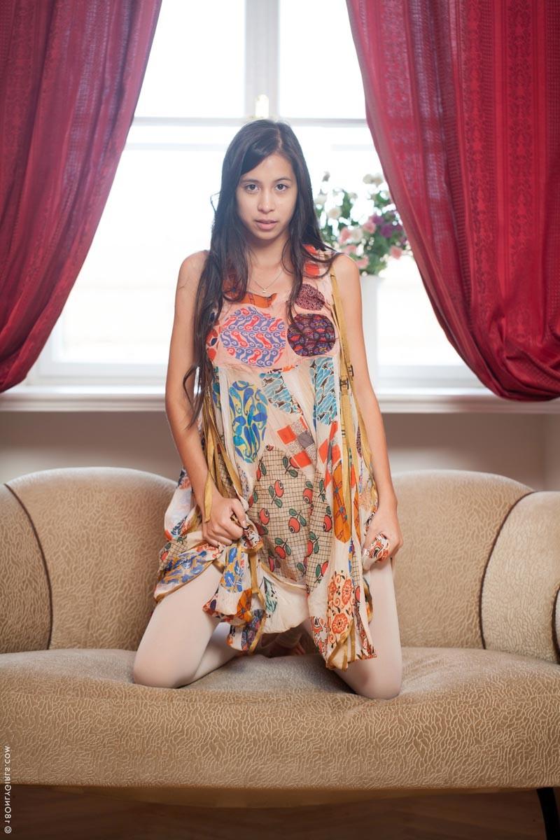 15P Sexy amateur teen poses naked on a couch